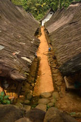 rural road between two houses in Kampung Naga, East Java, Indonesia