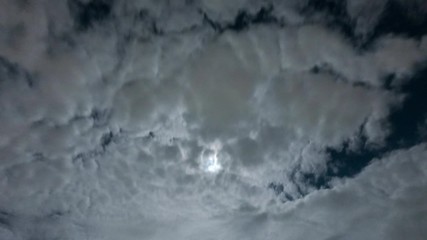 Wall Mural - clouds moving in sky at night time lapse