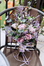 Wedding Bouquet Decorated With Lavender Flowers. A Solemn Event