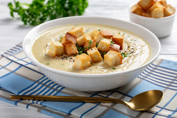 Poster - Asiago Roasted Garlic Cauliflower Soup in a bowl