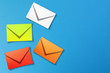 © ytemha34 - Colorful envelopes on blue background