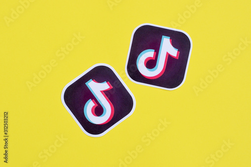 Tiktok Paper Logo On Yellow Background Tiktok Is A Popular Video Sharing Social Networking Service Owned By Bytedance Stock Photo Adobe Stock