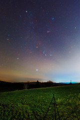 Wall Mural - Winter night sky including Barnard’s Loop, the Orion Nebula, the Flame Nebula, the Rosette Nebula, the California Nebula, and the Pleiades as seen from Stockach in Germany.