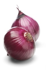 Canvas Print - Red onions over white background