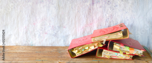 Fotomural Heap of messy, old, dusty file folders and documents, red tape, bureaucracy concept, panoramic, good copy space