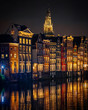 reflections in Amsterdam canals at night long exposure