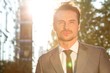 © MDBPIXS - Thoughtful young businessman outdoors