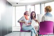 © MDBPIXS - Businesswomen discussing in creative office