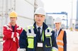 © MDBPIXS - Confident workers standing in shipping yard