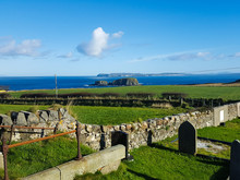 View Of Coast And Cemetery In Northern Ireland 