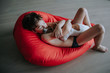 © Irina Polonina/Stocksy - Young boy playing with his dog