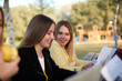 © Javier Pardina/Stocksy - group of students studying in the park