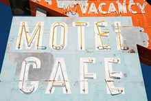Faded And Broken Neon Sign Along Route 66, USA