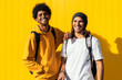 © Santi Nunez/Stocksy - Teenager friends laughing looking at camera
