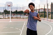 © Santi Nunez/Stocksy - Portrait of afro american man looking at camera