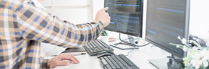 Wall Mural - programmer working in a software development and coding technologies. website design.technology conc