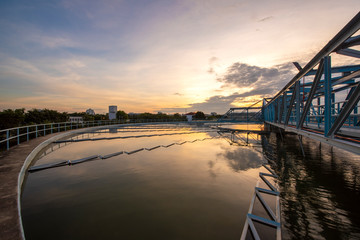 water treatment plant with sunrise