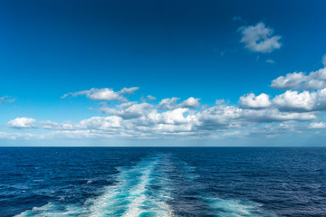 Trace of cruise ship on water surface of sea