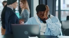 Portrait Tired African American Business Man Touching Head Working Hard On Laptop Upset Exhausted Young Office Work Worried Sleepy Stressed Frustrated Employee Corporate Slow Motion