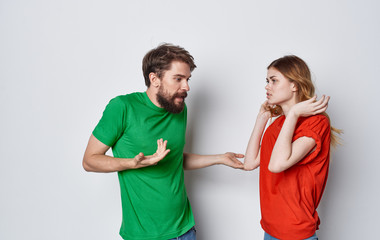 young couple in t-shirts chatting