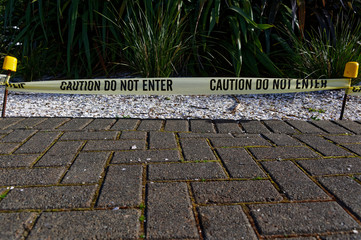 Caution Do Not Enter tape restricts access