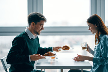 young couple having dinner in restaurant