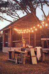 Table is set and waiting for dining in the countryside..