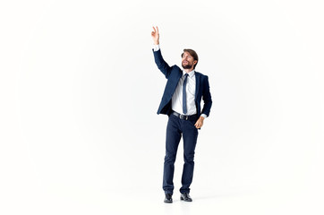 Wall Mural - business man in suit with arms raised in air