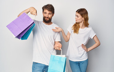 happy couple with shopping bags