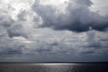 Wall Mural - clouds over the sea