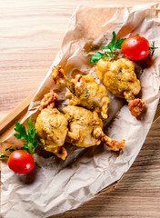 Wall Mural - Fried Chicken Wings on wooden table background