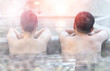 Nature Hotsping ans onsen travel tourism concept. Asia lover couple relax in natural hot spring water pool during vacation.