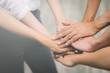 © Shutter B - Teamwork business join hand together concept, Business team standing hands together, Volunteer charity work. People joining for cooperation success business.
