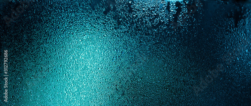 Blue color water drops on wet glass. Abstract texture background. Poster Mural XXL