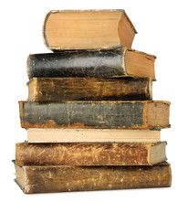 Isolated Old Books. Vintage Leather Books In A Stack Isolated On White With Clipping Path