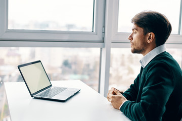 businessman working on laptop in office