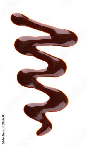 Chocolate syrup drizzle isolated on white background Poster Mural XXL