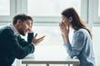 © SHOTPRIME STUDIO - woman and man talking on cell phone