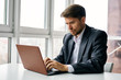 © SHOTPRIME STUDIO - businessman working on laptop in office