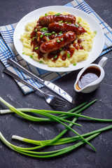 Canvas Print - Bangers and Mash with Onion Gravy on a plate