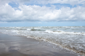 Fototapete - View from the beach to stormy sea. Windy weather  