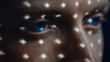 © Gorodenkoff - Biometric Facial Recognition Scanning of Blue Eye's Iris. Futuristic Concept: Projector Identifies Individual by Illuminating Face by Dots and Scanning with Laser. Close-up Shot