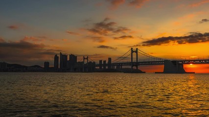 Wall Mural - Time Lapse 4k  Gwangan Bridge and Haeundae at Sunrise, Busan City, South Korea