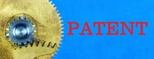 Patent-lettering Text On A Background Of Vintage Gears. A Patent Is A Protective Document Certifying The Official Recognition Of The Exclusive Right, Authorship And Priority Of Invention Achievement