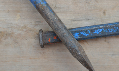 old construction of a house and repair tools on wooden background