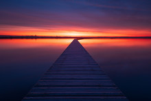 Very Colorful And Tranquil Dawn At A Jetty In A Lake. Groningen, Holland.