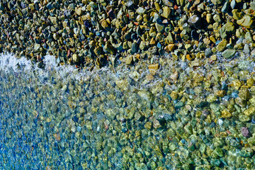 Canvas Print - Calm Surf on Colorful Rocky Shore