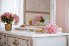 Boudoir Table For Girls. In The Bedroom. Interior In White And Pink Colors.