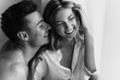 © Andriy Medvediuk - happy young loving couple smiling. Young couple in love have fun i on new years eve or st valentines day. black and white photo of young couple