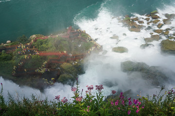 Wall Mural - Niagara Falls, NY: Overhead view of  tourists at the Cave of the Winds.